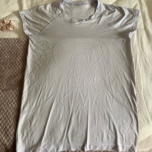 Lululemon Athletica short sleeve athletic top.